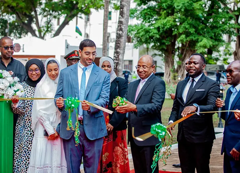 Guests cutting a green ribbon at an Infinity Foundation opening ceremony in Zanzibar